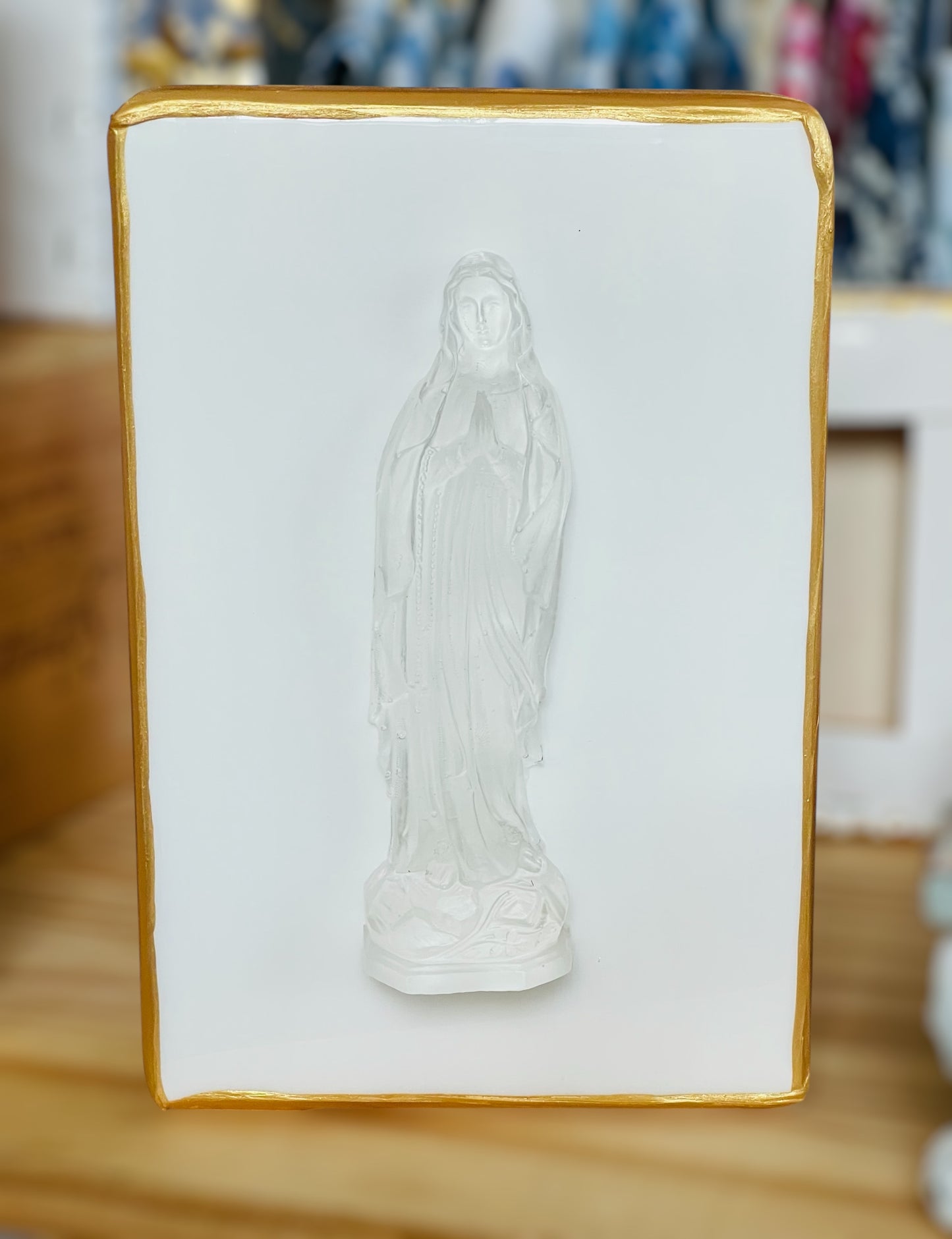 Mother Mary Clear Statue on White Wood Block