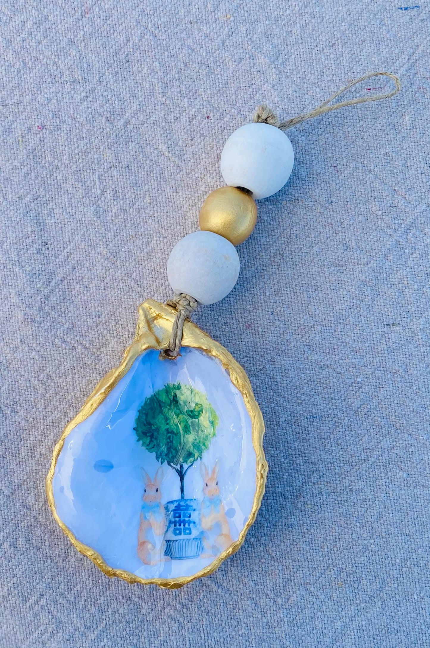 Bunnies with Blue Bows Oyster Ornament