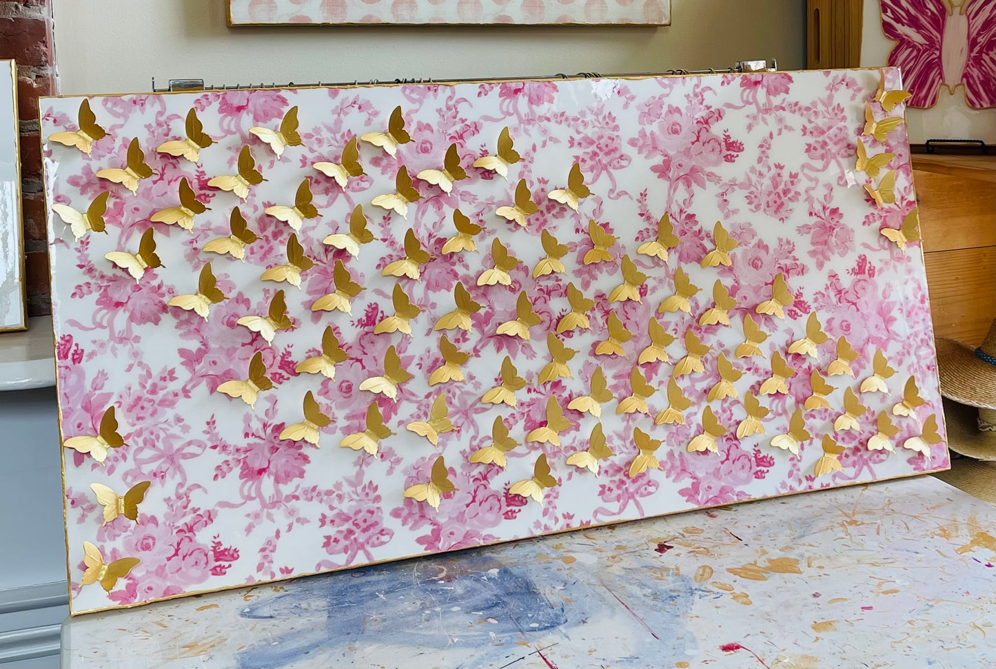 Gold Flying Butterflies on Pink Floral Canvas