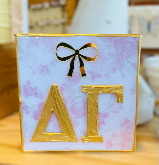 Delta Gamma on Light Pink Floral with Gold Bow