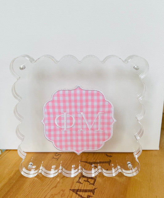 Embroidered Phi Mu on Pink Gingham in ScallopedAcrylic Frame