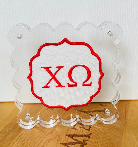 Embroidered Chi Omega On White Linen in Scalloped Acrylic Frame