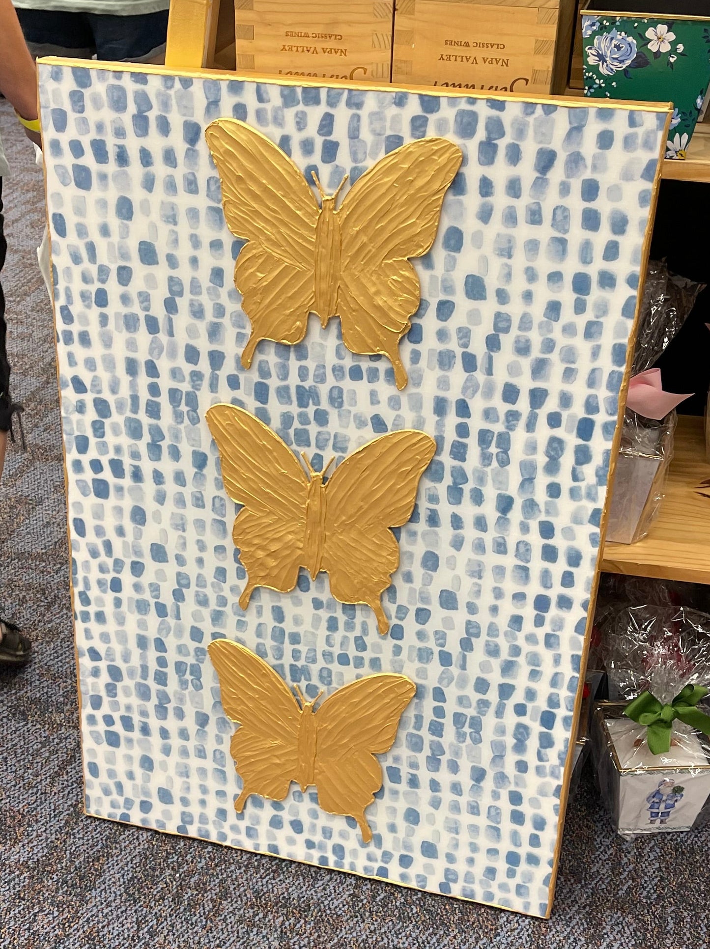 Three Gold Butterflies with Blue/White Background